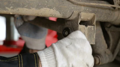 Professional car mechanic working in auto repair service. Stock Footage 95422551