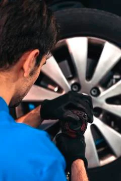 Professional Car Mechanic working. Stock Photos