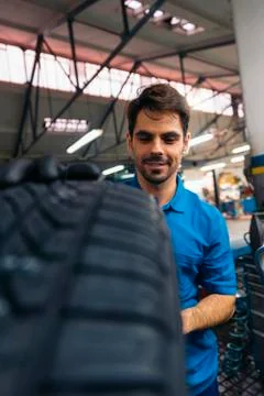 Professional Car Mechanic working. Stock Photos