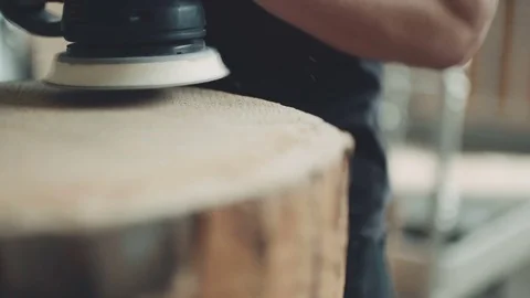 Professional Carpenter grinds Wood In Workshop Stock Footage 83189042