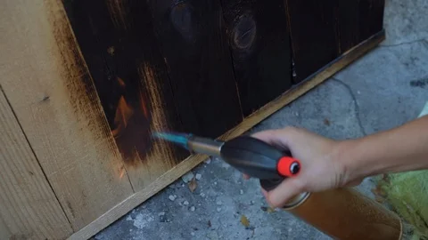 Professional carpenter using old traditional japanese technique. Burning wood Stock-Footage 115432570