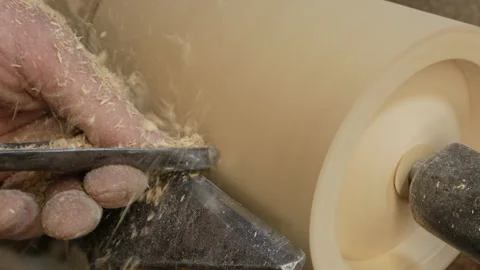 Professional carpenter is using skew chisel for shaping piece of wood. Stock Footage 151070626