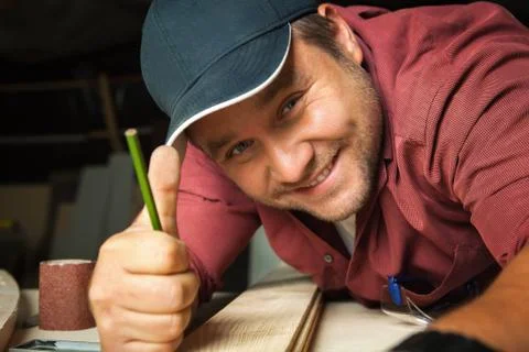 Professional carpenter at work. Stock Photos