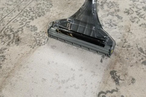 Professional Carpet Cleaning Process with Advanced Equipment Stock Photos