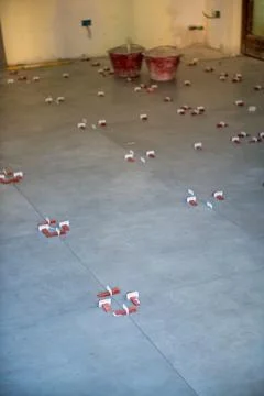 Professional Ceramic Floor Tiles Installation with Tools for Perfect Home R.. Stock Photos