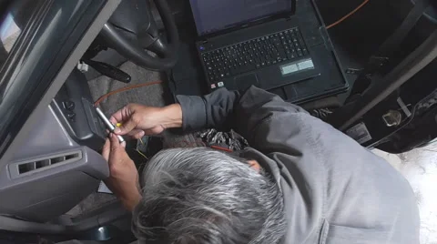 Professional checking vehicle circuits with a computer Stock Footage 54015595