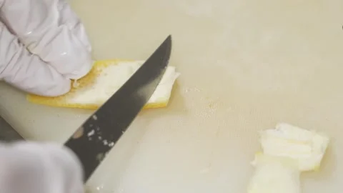 Professional Chef Carefully Zesting Fresh Lemon for Gourmet Dessert Preparation Stock Footage 337751181