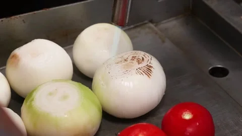 Professional Chef Charring Whole White Onions and Tomatoes with Blowtorch on Gri Stock Footage 331635204