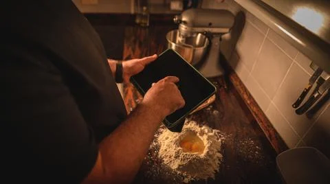 Professional chef checking the ingredients and using his hands for grounding a d Stock Photos