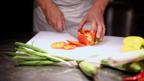 Professional chef chopping red pepper Stock Footage 72922897