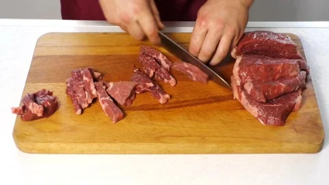 Professional chef cooking and cutting meat Video stock 267732476