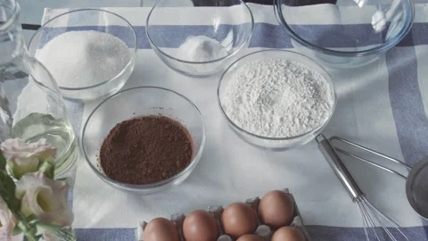 Professional chef is cooking cake. Young attractive housewife cooking dough to Stock Footage 132436457