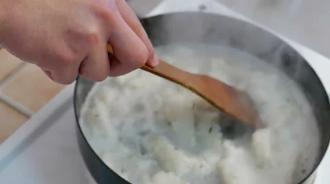 Professional Chef Cooks Fish in a Pan in Slow Motion Stock Footage 60611767