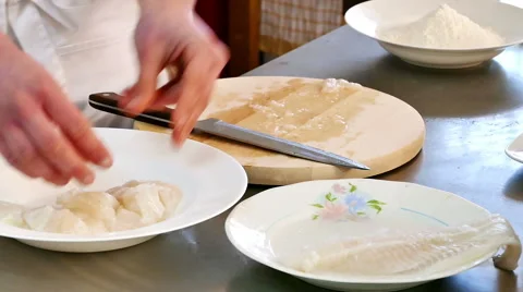 Professional Chef Cut Fish in a Kitchen in Slow Motion Stock Footage 59592001