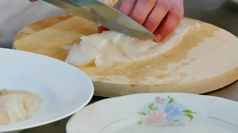 Professional Chef Cut Fish in a Kitchen in Slow Motion Video stock 59592029