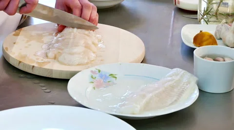 Professional Chef Cut Fish in a Kitchen in Slow Motion Stock-Footage 59592150