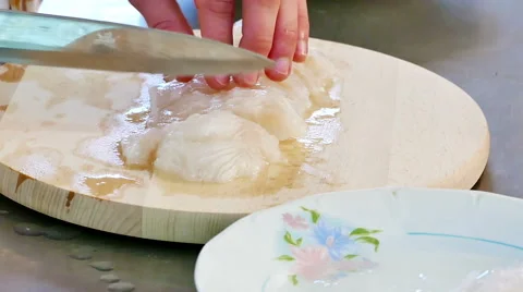 Professional Chef Cut Fish in a Kitchen in Slow Motion Stock Footage 59592171