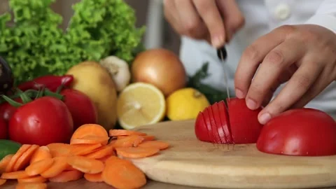 Professional Chef Cutting Fresh Tomato. Healthy Cooking Concept. Stock Footage 343744852