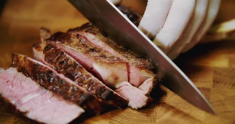 Professional chef is cutting steak Stock Footage 88961463