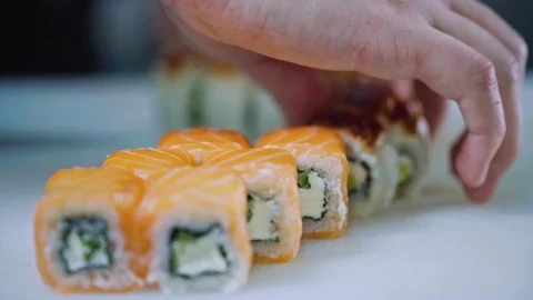 Professional chef cutting sushi Stock-Footage 85456943