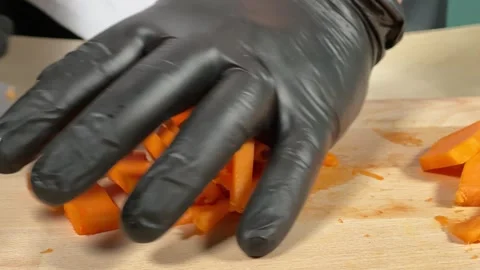 Professional chef cutting vegetables with kitchen knife, close-up Stock Footage 306803156