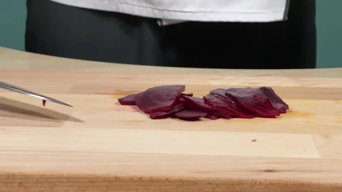 Professional chef cutting vegetables with kitchen knife, close-up Stock Footage 306803508