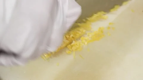 Professional Chef Hands Grating Fresh Lemon Zest for Homemade Dessert Pie, Close Stock Footage 337751182