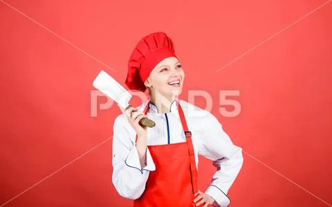 Professional chef in kitchen. Cuisine. happy woman cooking healthy food by Stock Photos