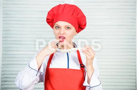 Professional chef in kitchen. Cuisine. woman in cook hat and apron. happy woman Stock-Fotos