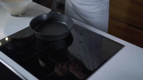 Professional Chef in the Kitchen of Restaurant prepares Pancakes. Slow motion 스톡 동영상 143415985