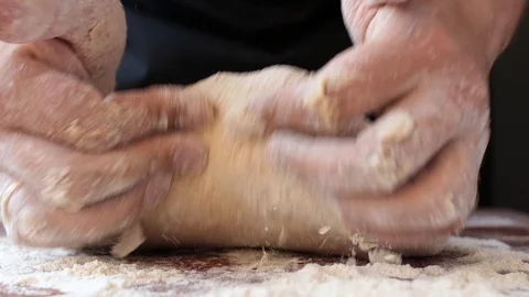 Professional chef knead the dough for bread Stock-Footage 113353965
