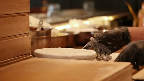Professional Chef Kneading Pizza Dough with Flour in Commercial Kitchen Stock Footage 341924426