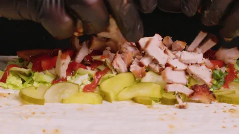 Professional chef is making shawarma at fast food cafe, close-up. Stock Footage 158491905