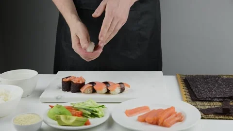 Professional chef making sushi at restaurant. Stock Footage 149525446