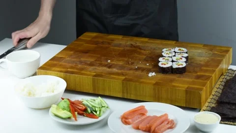 Professional chef making sushi at restaurant. Stock Footage 149525449