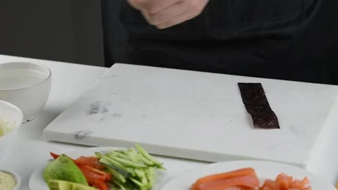 Professional chef making sushi at restaurant. Stock Footage 149525455