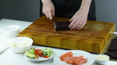 Professional chef making sushi at restaurant. Stock Footage 149525461