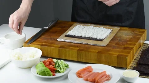 Professional chef making sushi at restaurant. Stock Footage 149525472
