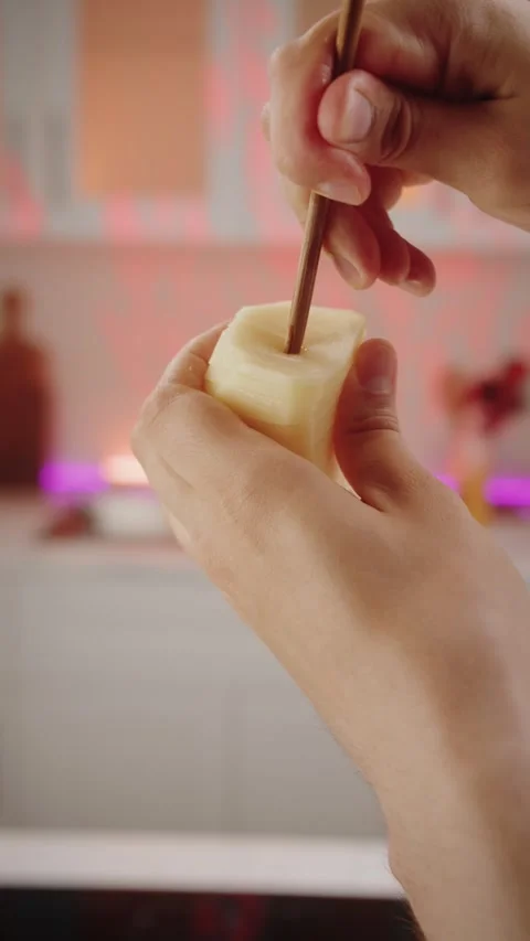 Professional Chef Pierces Raw Potatoes 스톡 동영상 280351007