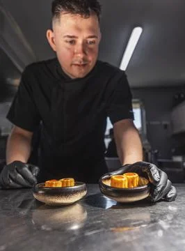 Professional chef plating elegant appetizers Stock Photos