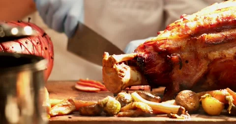 Professional chef prepares a delicious ham dish in a restaurant kitchen Stock Footage 237707592