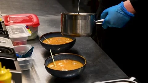 Professional chef prepares delicious miso soup of japanese cuisine in the res Stock Footage 209145591