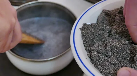 Professional Chef Prepares the Filling for Cakes with Poppy Seeds Stock-Footage 59591207