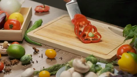 Professional chef prepares red bell pepper. Slow motion. Stock Footage 138677835