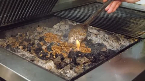Professional Chef Preparing Charcoal Grill with Glowing Coals and Flames 스톡 동영상 332814645