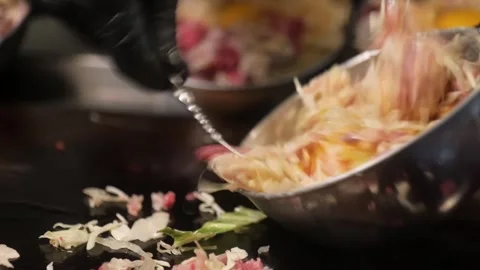 Professional Chef Preparing Fresh Shredded Cabbage Salad in a Stainless Steel Bo Stockbeeldmateriaal 333489882