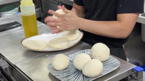 Professional chef preparing pizza dough in restaurant kitchen 스톡 동영상 344099982