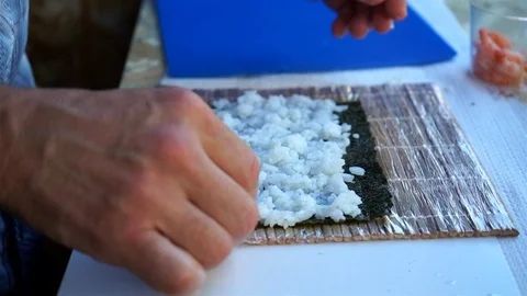 Professional Chef Preparing Sushi Rolls. Stock Footage 102780922