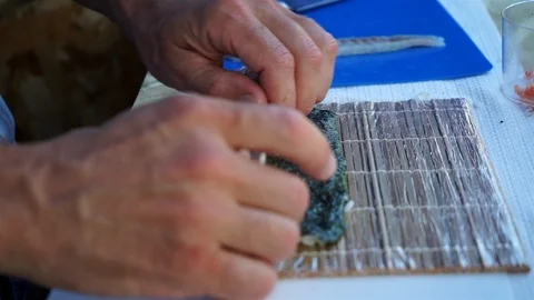 Professional Chef Preparing Sushi Rolls. Stock Footage 102780981