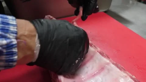 Professional Chef Prepping Raw Pork Ribs Removing Membrane Silver Skin Close Up Stock Footage 338212309